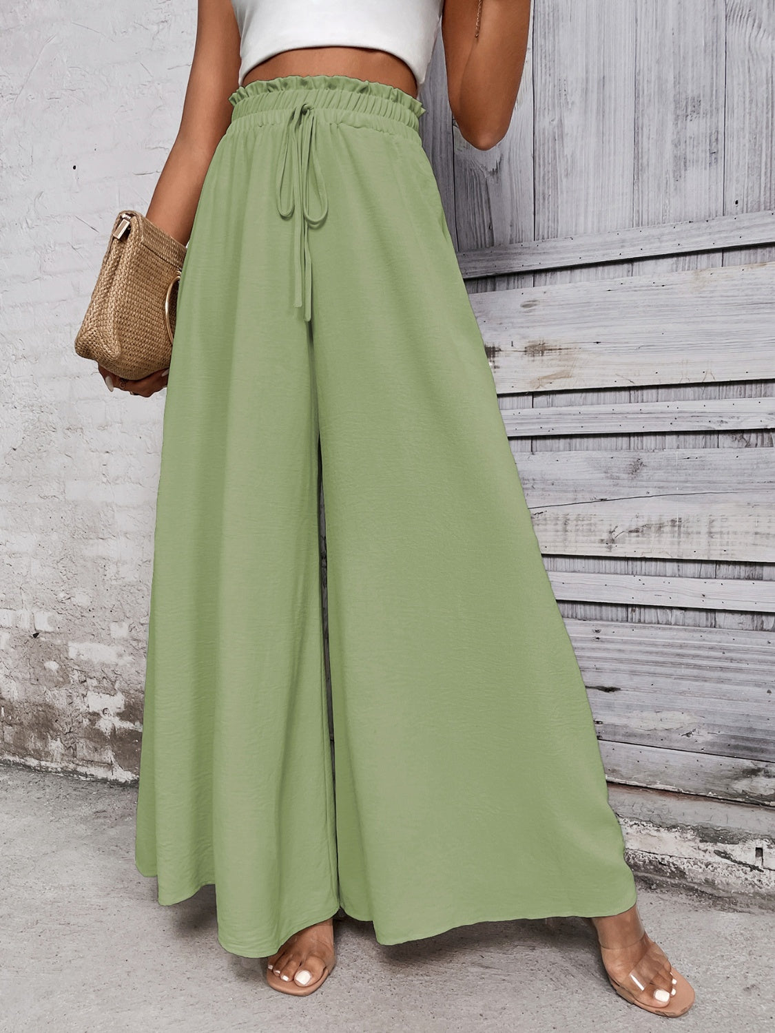 Boho high waist wide leg pants in green with tie detail.