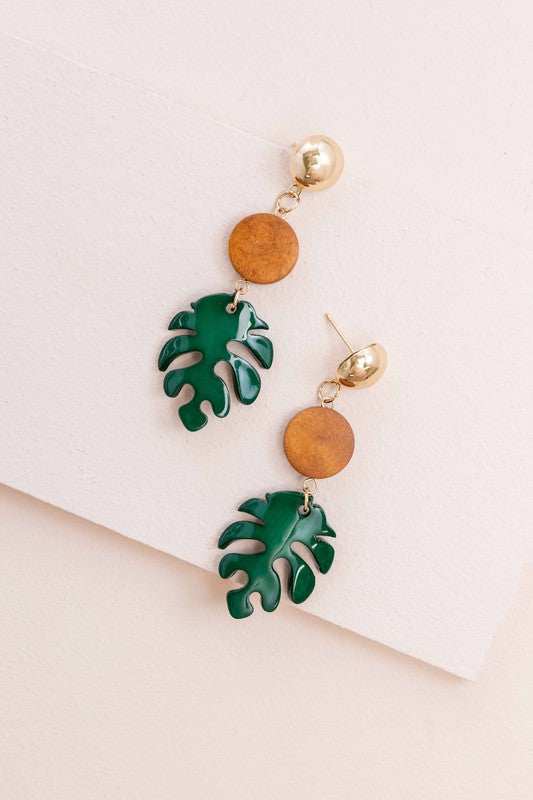 Tropical paradise palm leaf dangle earrings made with acetate and brass.