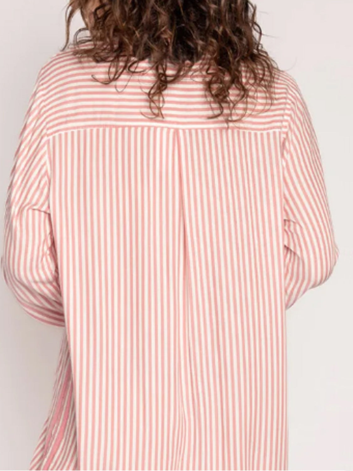 Striped collared neck long sleeve top in pink and white, back view.