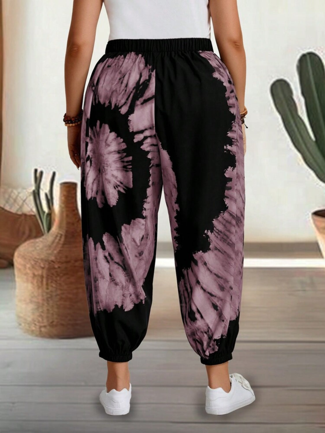 Tie-Dye Elastic Waist Pants in black and purple, polyester material, basic style, shown indoors.