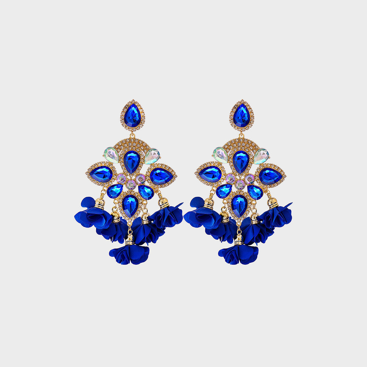 Flower shape rhinestone alloy dangle earrings with blue stones.