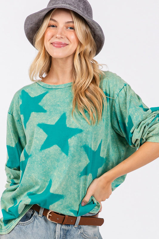 Mineral wash star pattern T-shirt on model, trendy and stylish design.