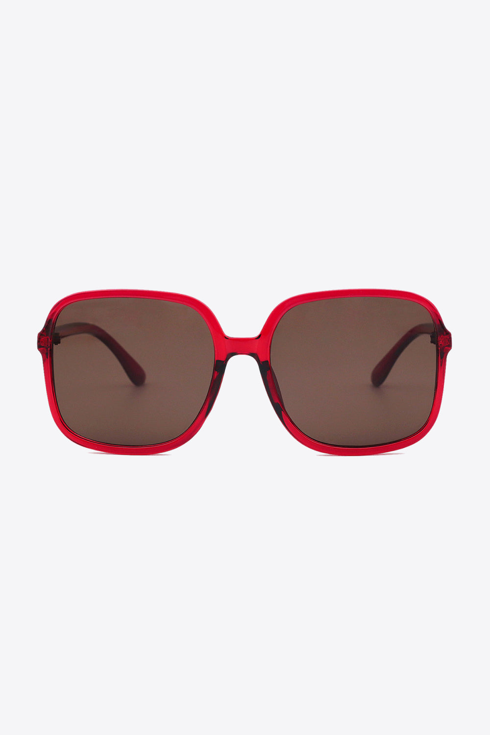 Oversized square sunglasses with red polycarbonate frame and UV400 protection.