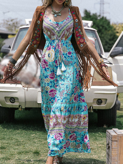 Bohemian printed scoop neck sleeveless maxi dress with floral pattern, perfect for beach style.