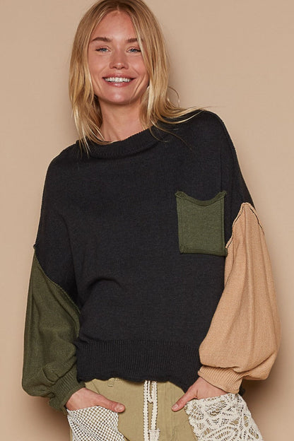 Color Block Roll Hem Hacci Sweater with exposed seam and pocket, featuring a stylish and cozy design.