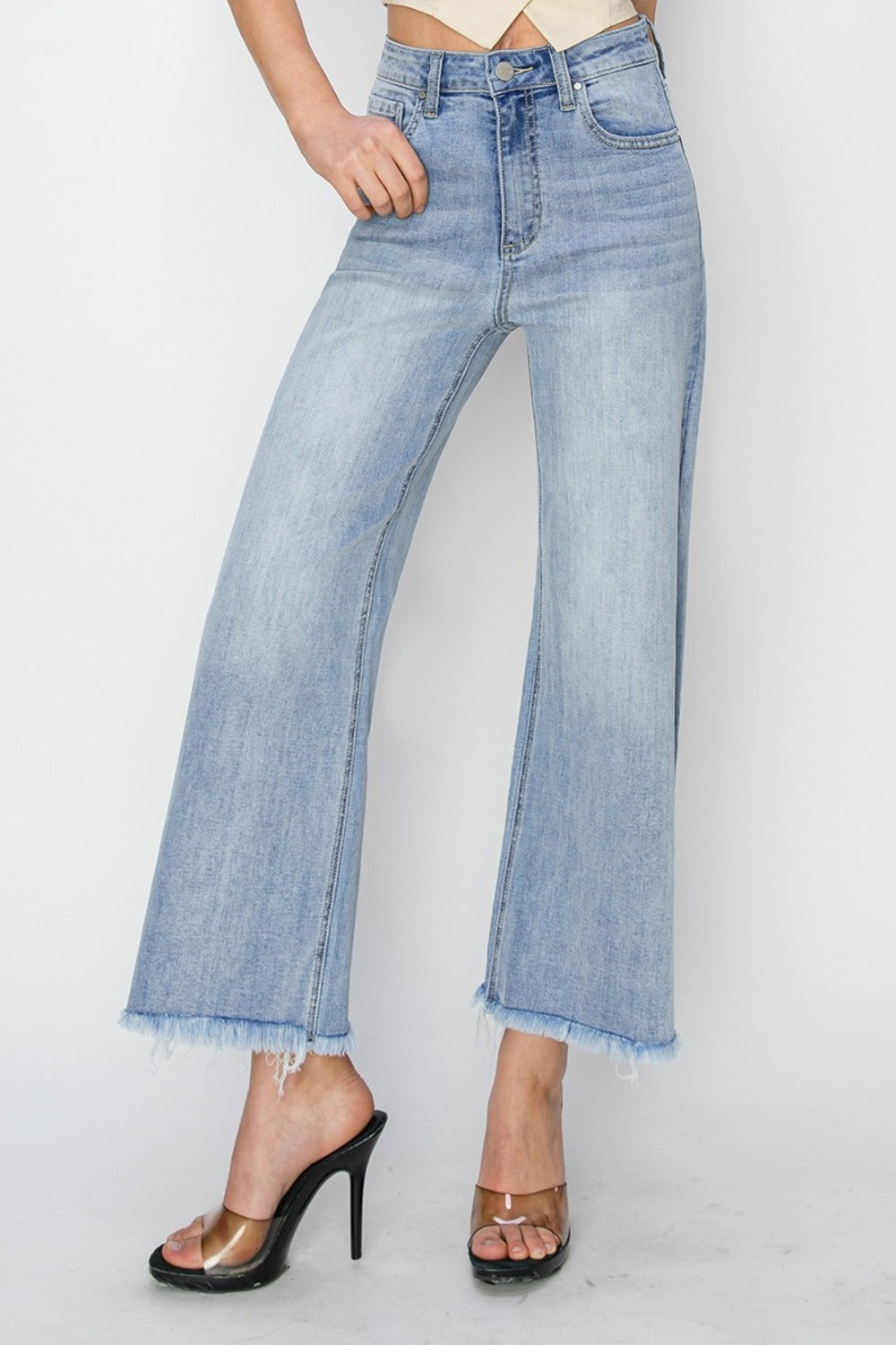 High Rise Crop Wide Fray Hem Jeans with relaxed fit and frayed hem.