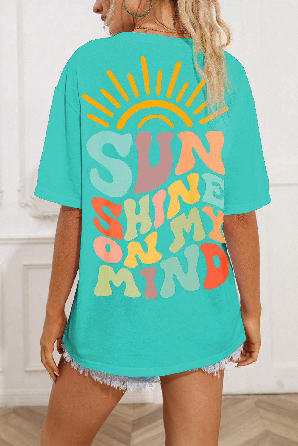 Sunshine On My Mind Graphic T-Shirt in teal with colorful lettering.