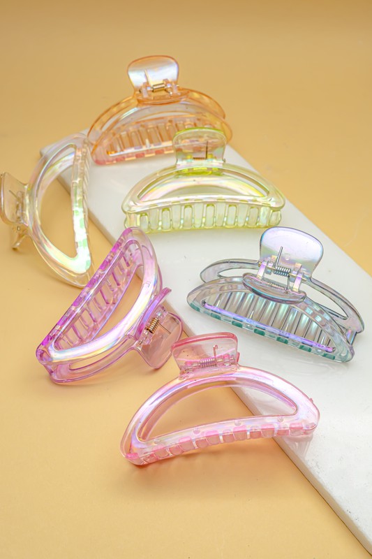 Iridescent Hair Claw Clips in Morandi colors and crescent shape displayed on a white surface.