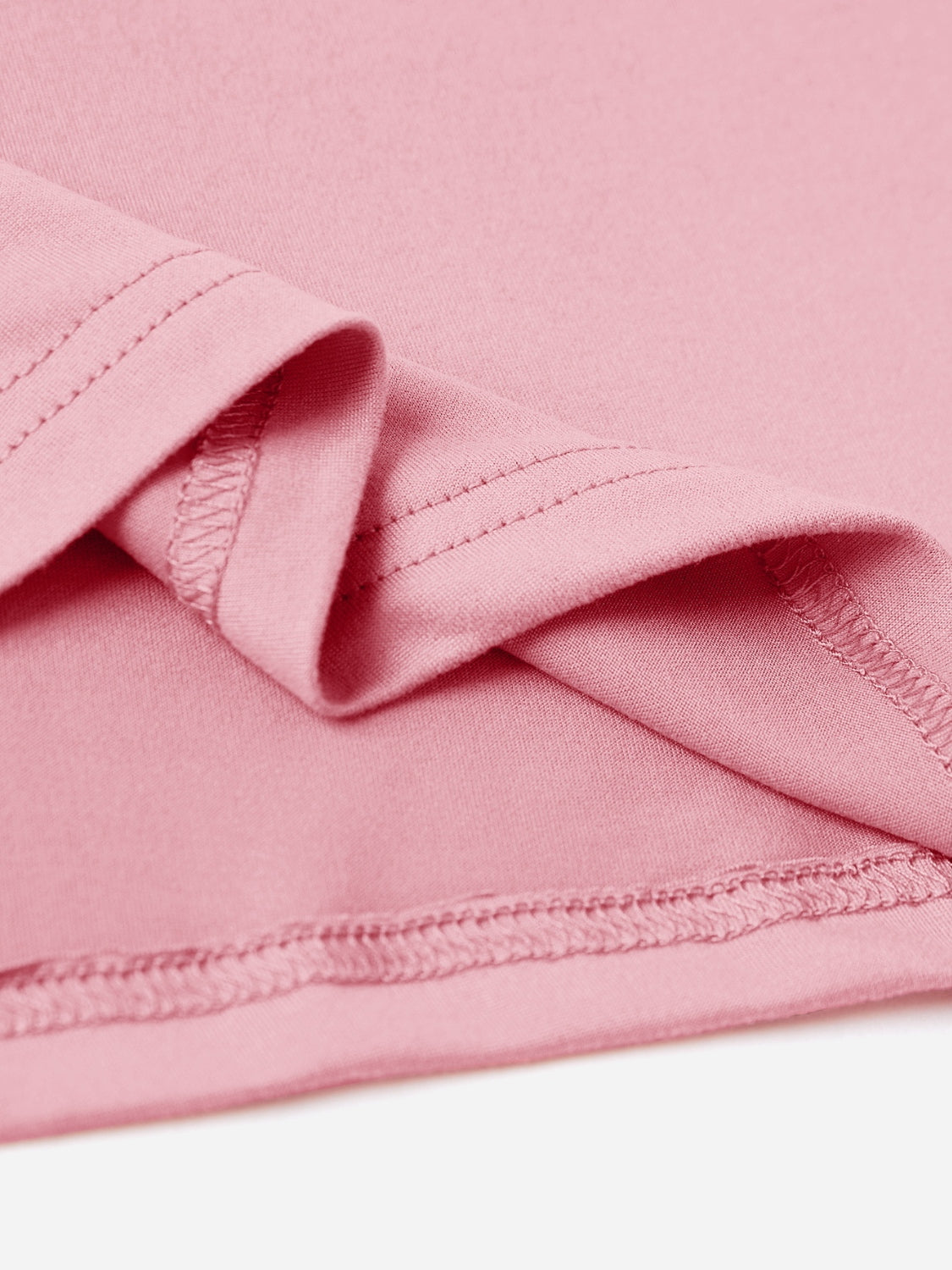 Close-up of pink fabric stitching on a Vintage '83 Graphic T-Shirt made of 100% polyester.