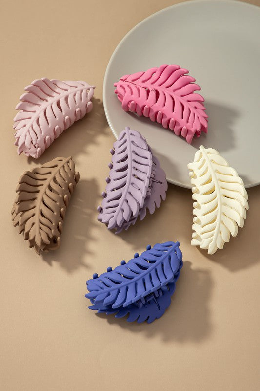 Feather-shaped matte hair claw clips in various colors made of high-quality acrylic.