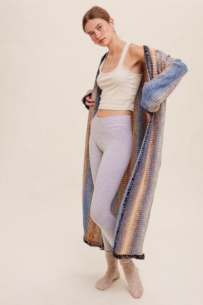 Multi Color Gradient Long Knit Open Cardigan with long sleeves and side seam pockets.