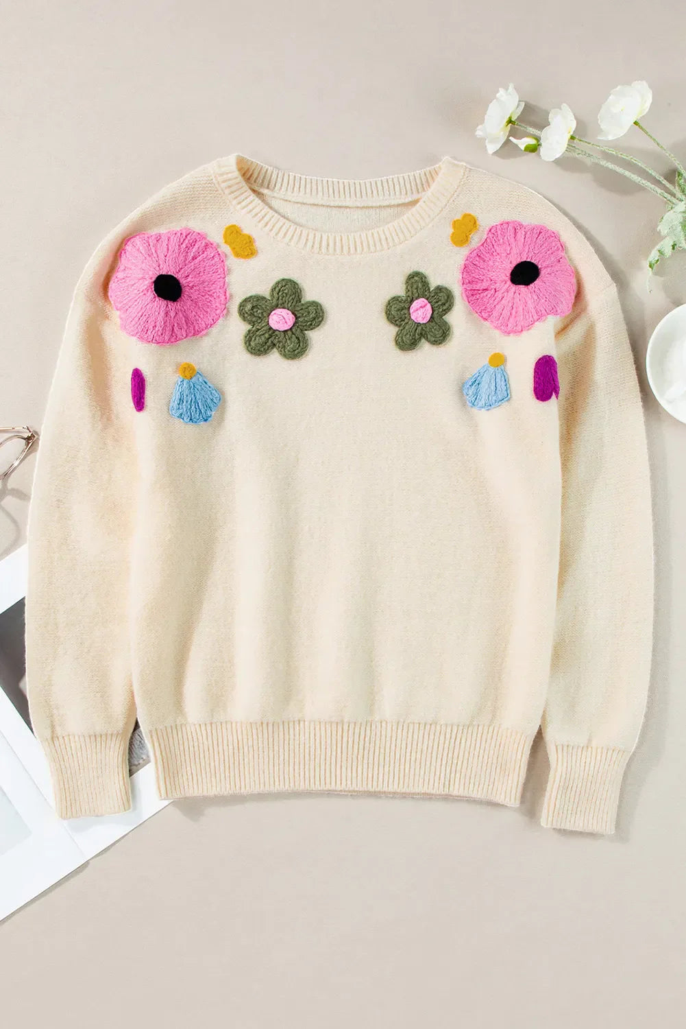 Plus size crochet flower round neck long sleeve sweater.