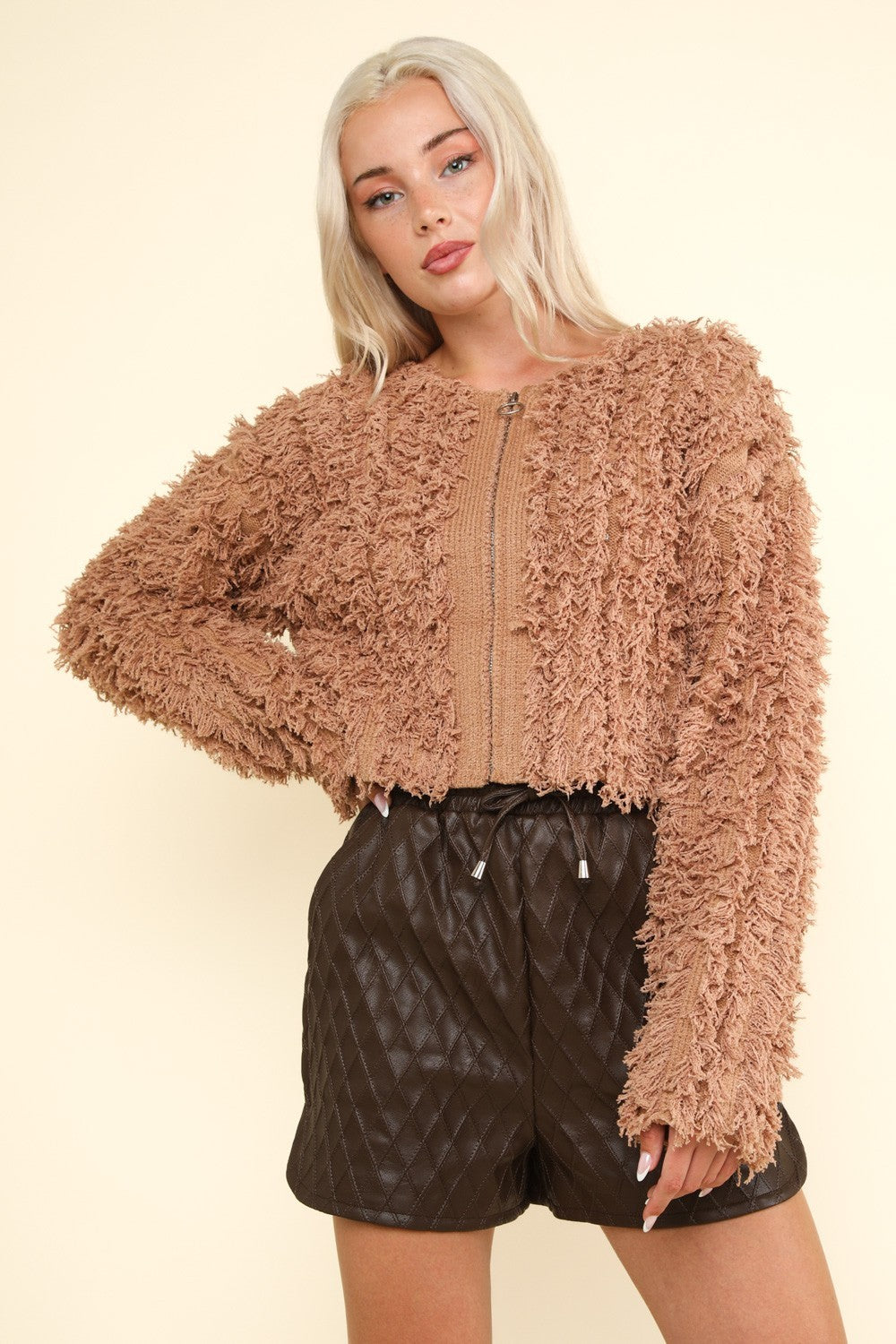 Shaggy Yarn Knit Zip Up Jacket with drop shoulder design and long sleeves.