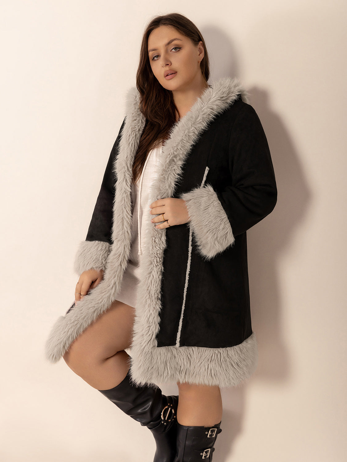 Plus size fuzzy trim open front long sleeve hooded coat with raw hem.