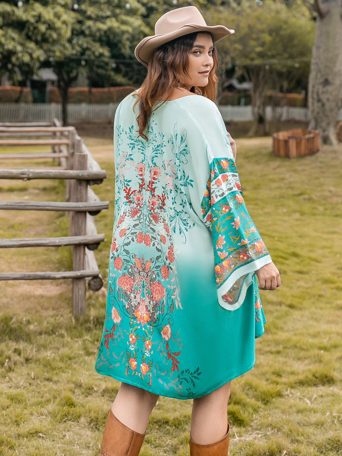 Plus size printed open front long sleeve cover up in vibrant colors, featuring slight stretch and viscose material.