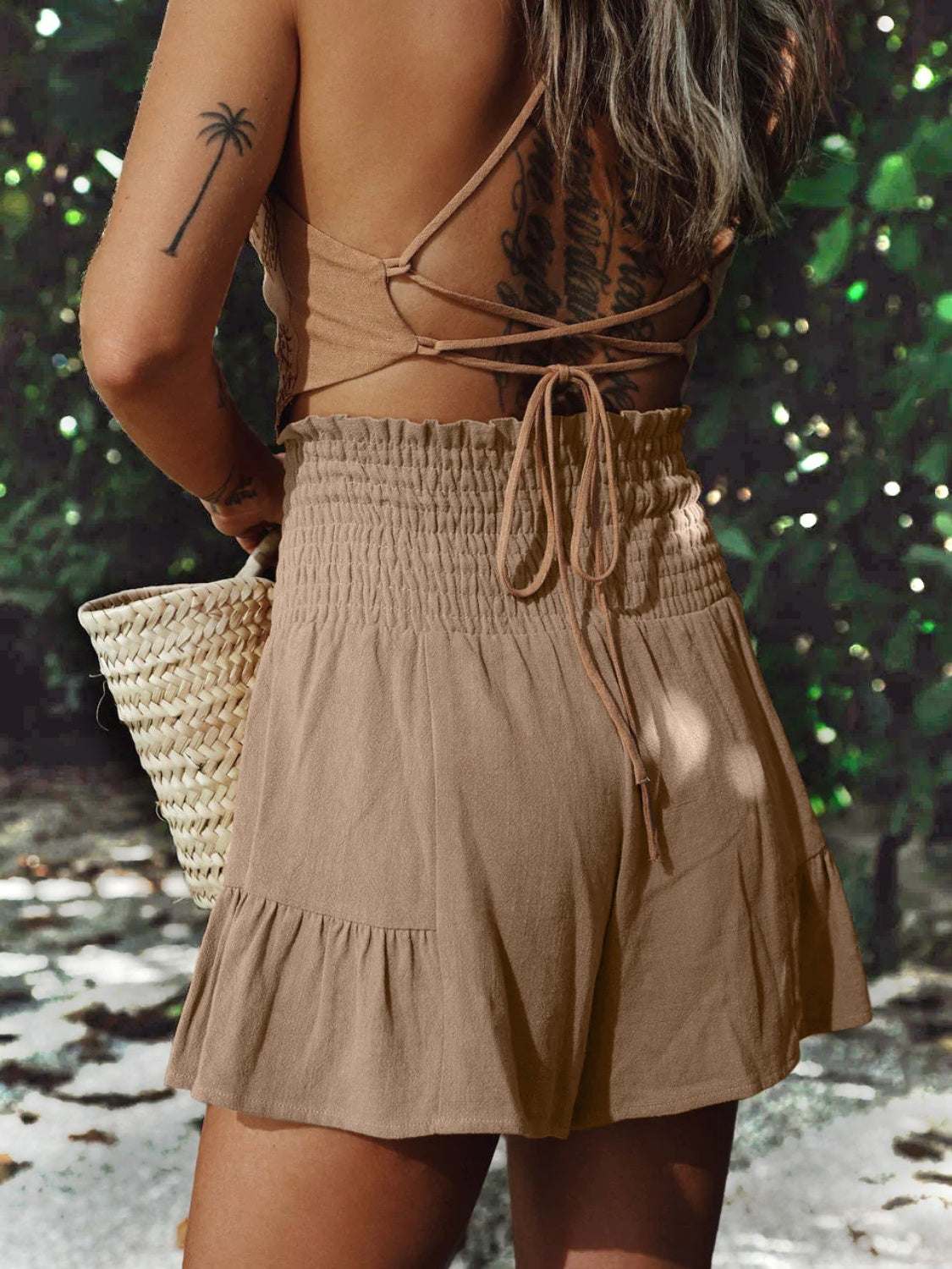 Boho ruffled high waist flowy shorts in light brown, featuring smocked design, perfect for a bohemian style.