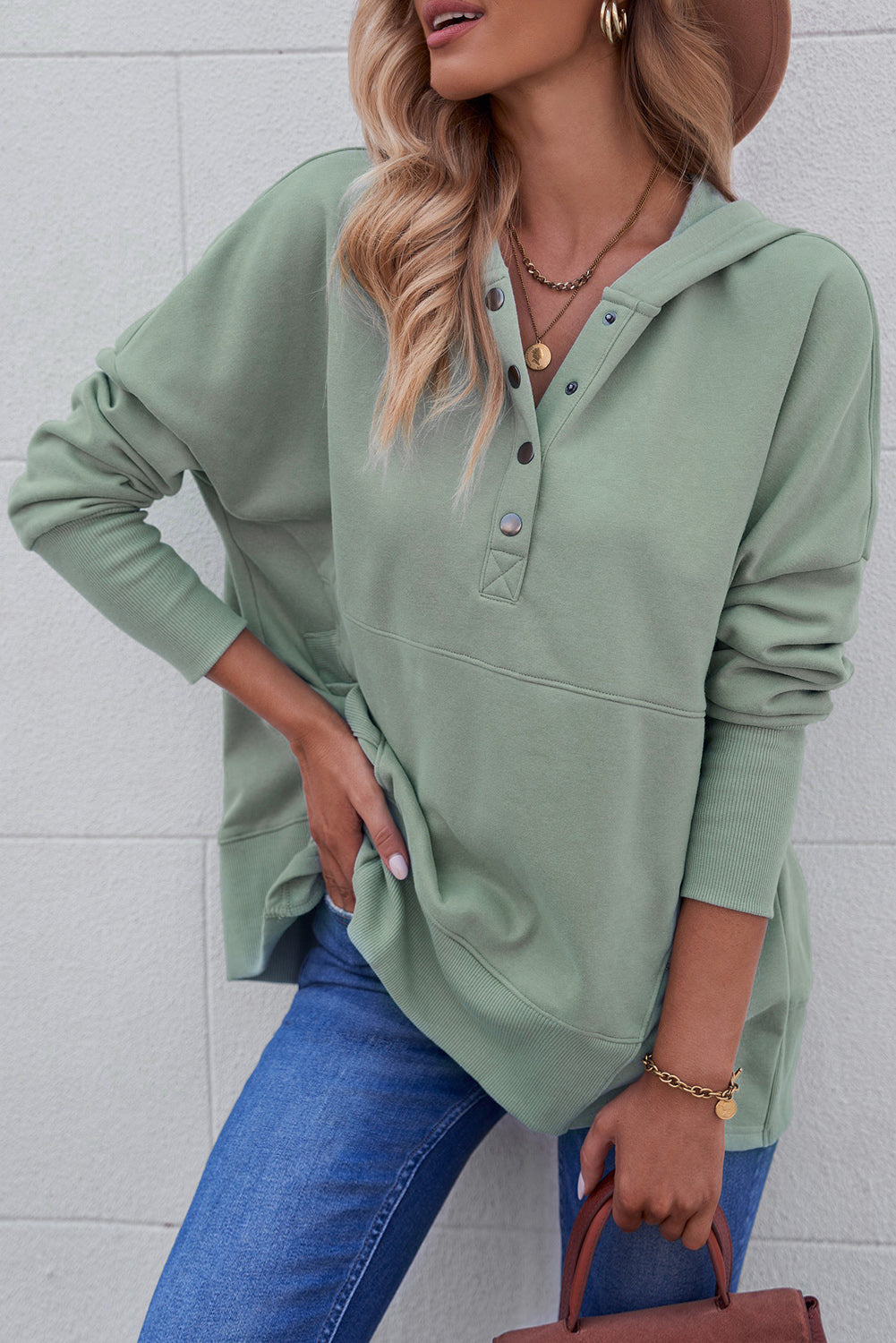 Quarter-Snap Dropped Shoulder Hoodie in sage green with buttoned pocket and relaxed fit.