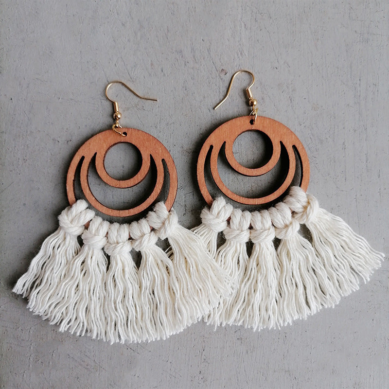 Boho chic geometric earrings with tassel detail.