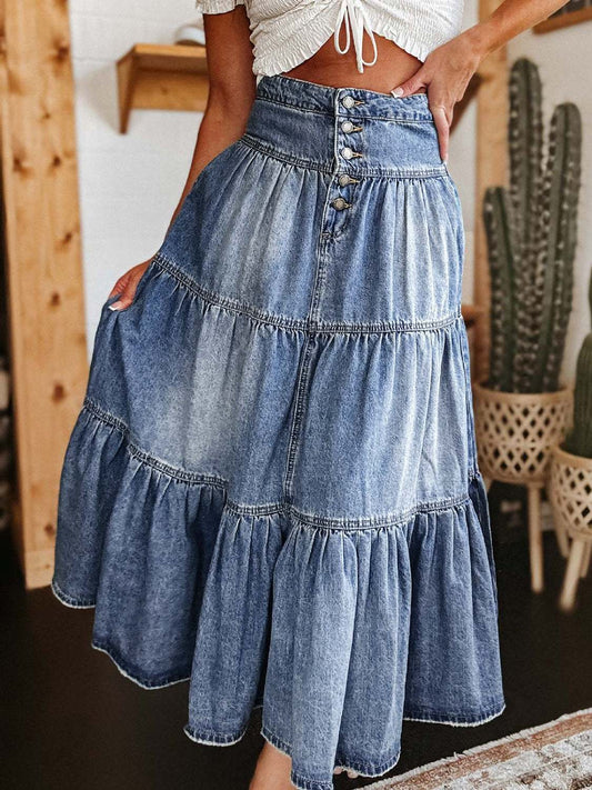 Tiered button fly denim skirt with no stretch, featuring layered design.