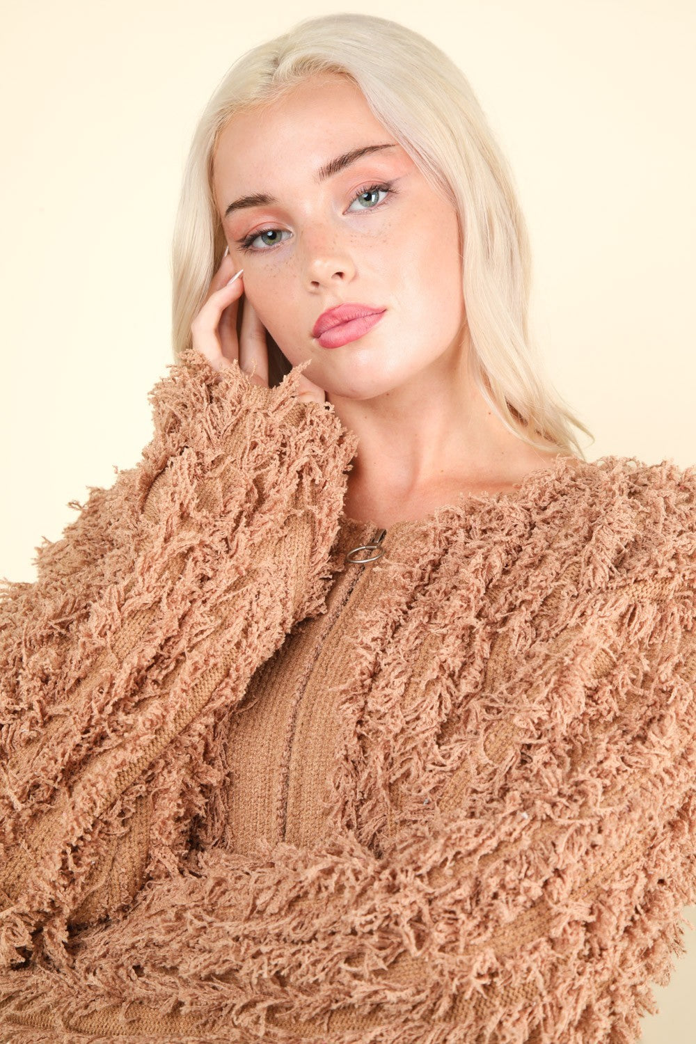 Shaggy Yarn Knit Zip Up Jacket with textured fabric and zip closure.