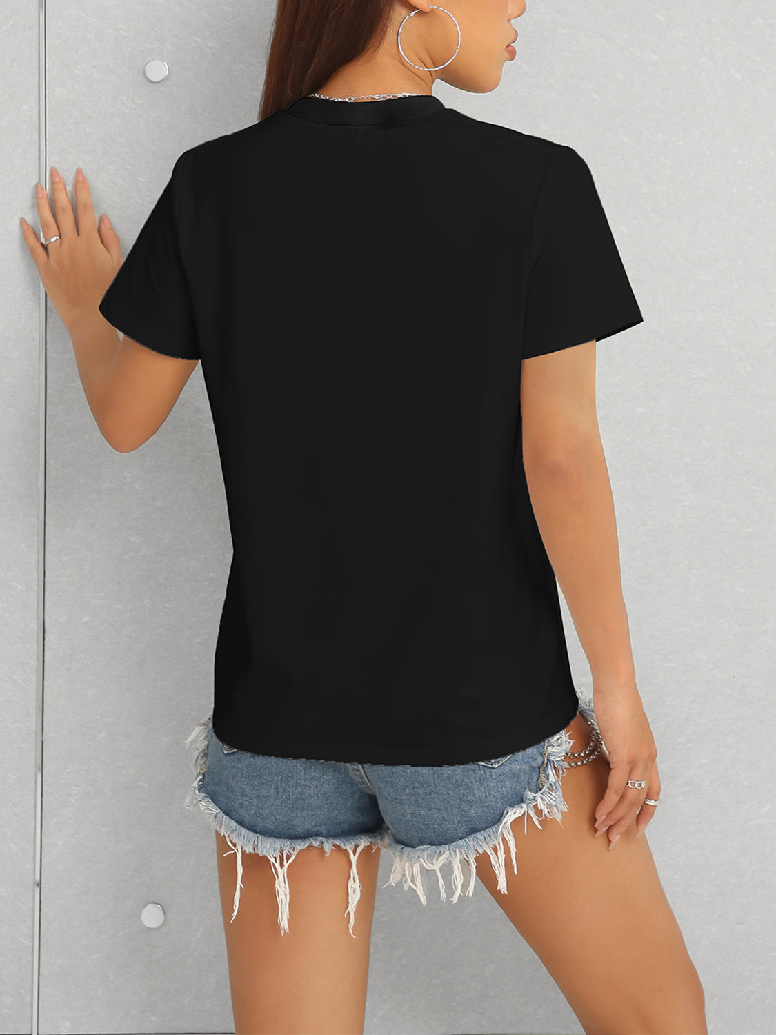 Silly Goose Graphic T-Shirt in black, back view, featuring basic style and slightly stretchy fabric.