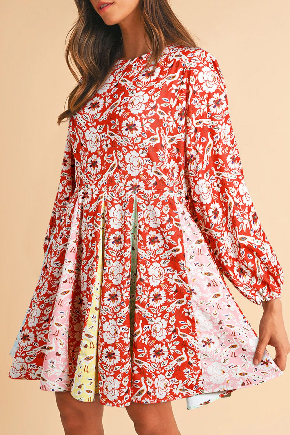 Red floral patchwork long sleeve pleated mini dress.