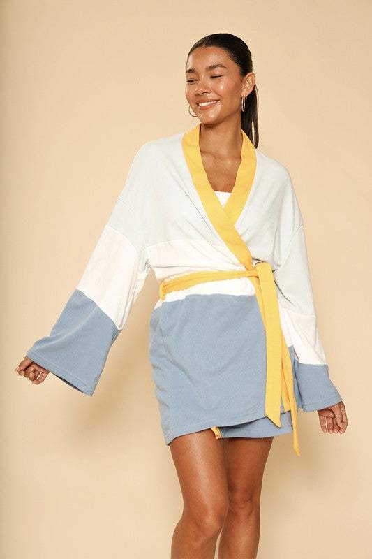 Sunset Terry Cloth Robe with waist ties and unique design showcasing luxury and comfort.