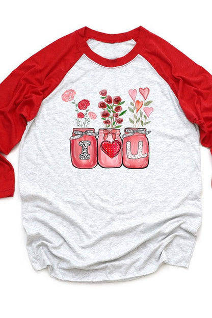 Valentine's Day I Heart You graphic top with red raglan sleeves.