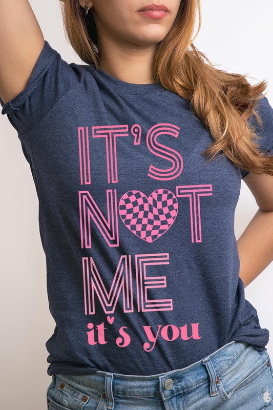 It’s Not Me It’s You Valentine's Day Graphic T-Shirt with pink lettering on a navy blue background.