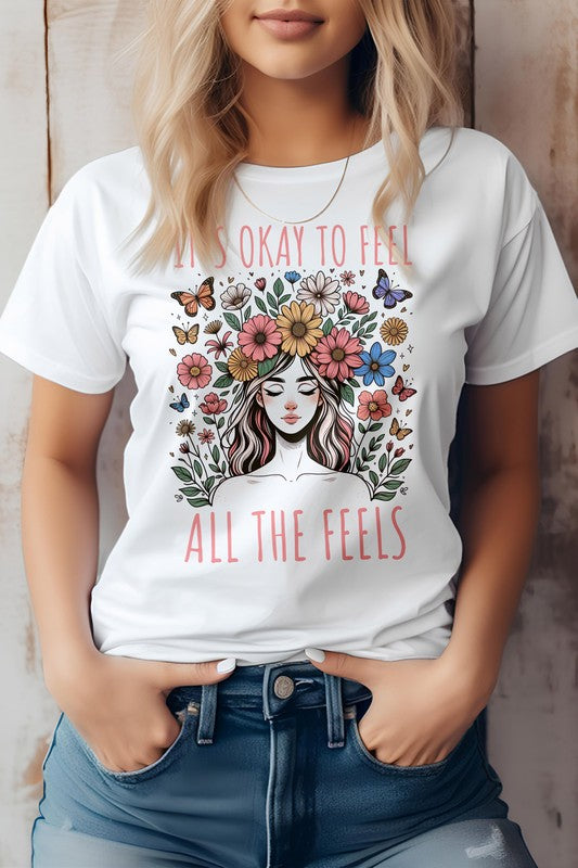 It's Okay to Feel All the Feels Boho Graphic Tee with floral design, eco-friendly cotton, unisex fit.