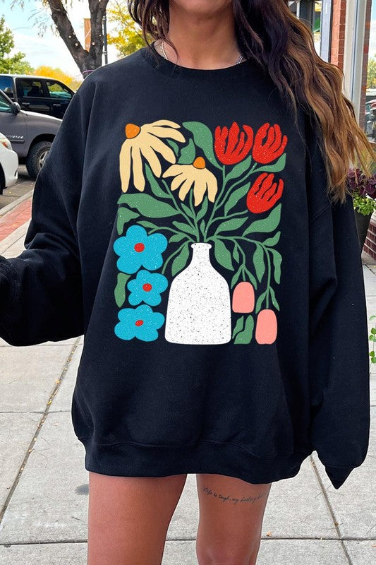 Boho Abstract Floral Graphic Sweatshirt with vibrant floral design.