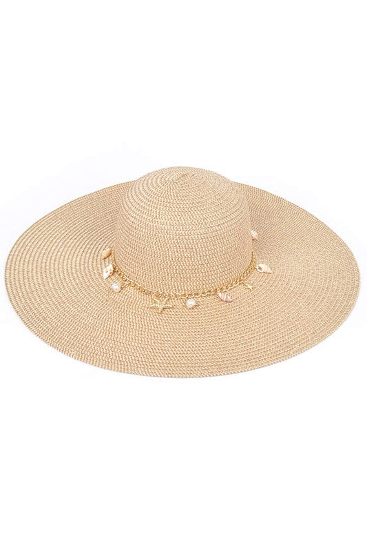 Pearl Mix Charm Floppy Sun Hat made of faux straw with shell and pearl accents.