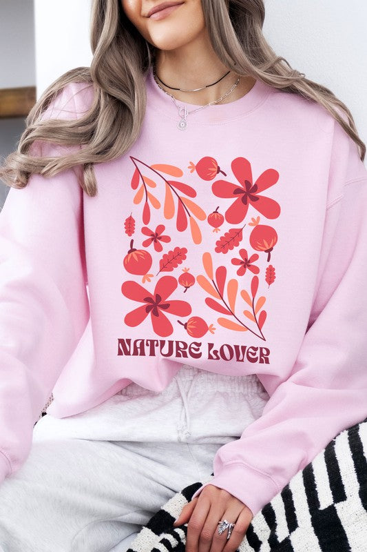 Nature Lover Graphic Sweatshirt with floral design, oversized fit, in pink.