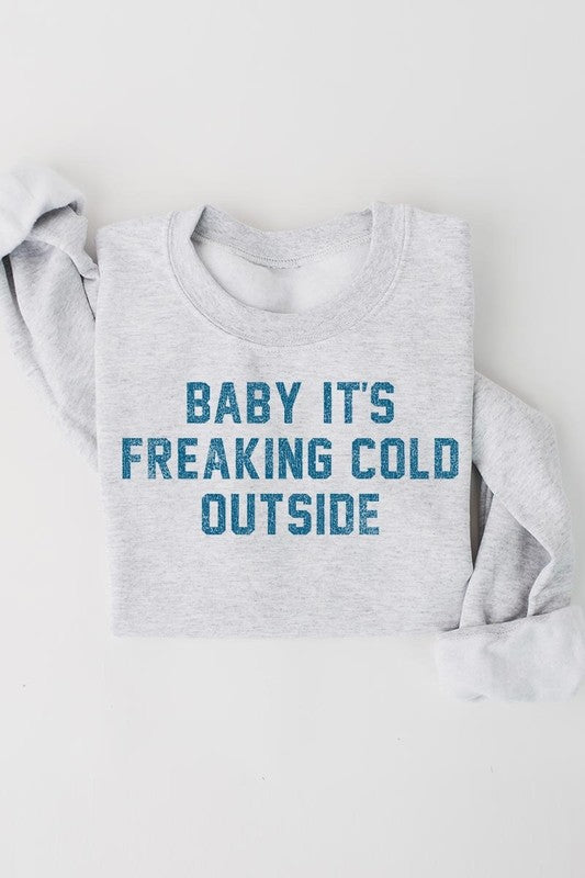 Unisex "Baby It's Freaking Cold Outside" graphic sweatshirt by Gildan.