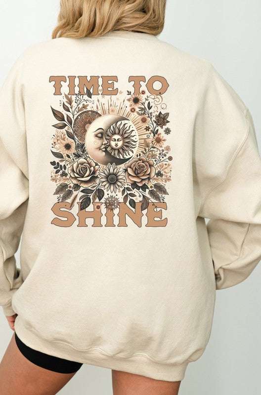 Beige Shine Crew Sweatshirt with floral and sun design on the back.