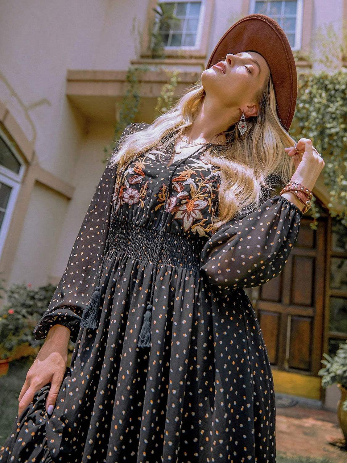 Embroidered polka dot tie neck long sleeve midi dress in black with floral details.