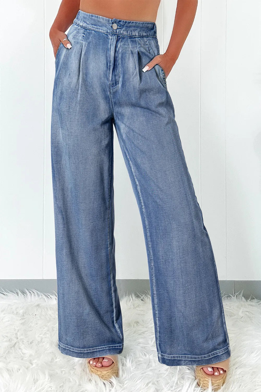 High waist wide leg jeans with pockets, no stretch, 95% cotton, and 5% polyester.