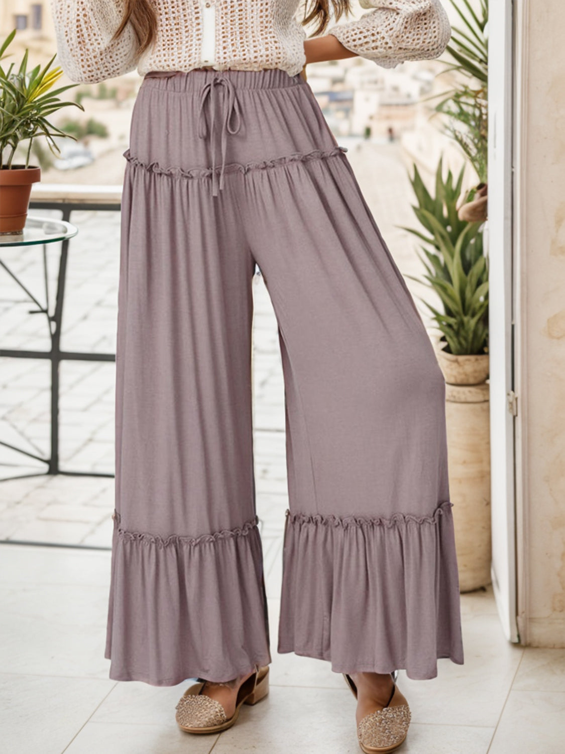 Wide leg ruffle trim pants in boho style for women, high waist, flowy fit.