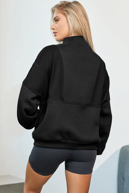 Oversized half zip dropped shoulder sweatshirt with pockets, black.