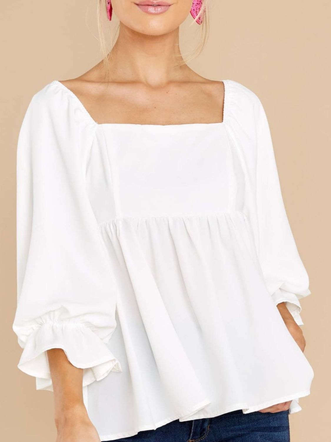 White smocked square neck flounce sleeve blouse, ruffled design, polyester fabric.