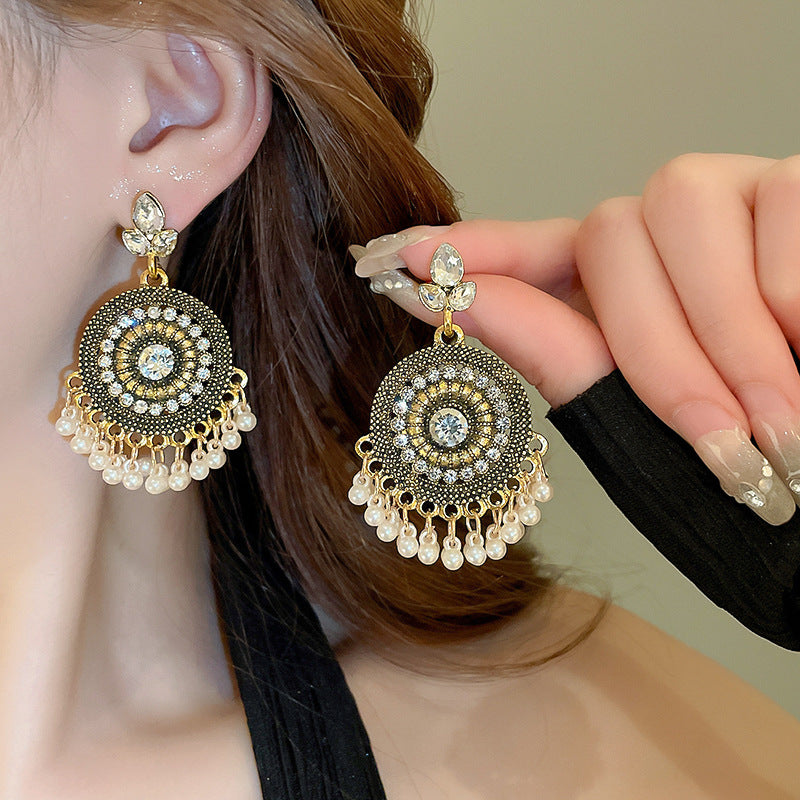 Rhinestone Alloy Bead Dangle Earrings on person, detailed design, 2.3 inches long.