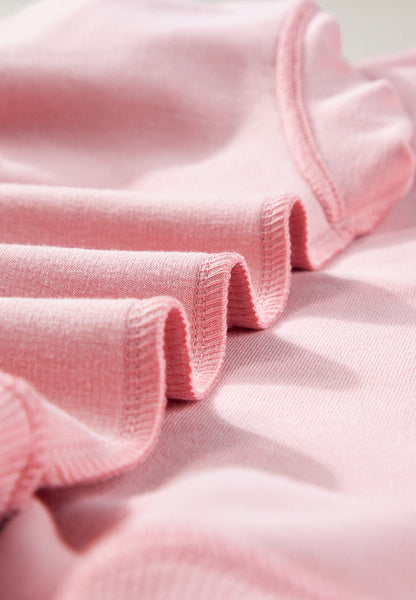 Close-up of pink fabric texture of a round neck long sleeve sweatshirt.