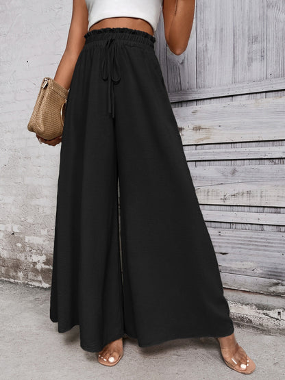 Boho high waist wide leg pants in black with tie detail, 100% cotton.