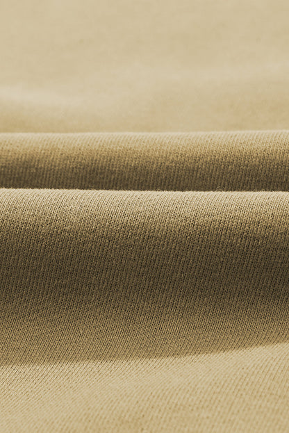 Close-up of fabric texture for Quarter-Snap Dropped Shoulder Hoodie, showcasing a blend of polyester and cotton.