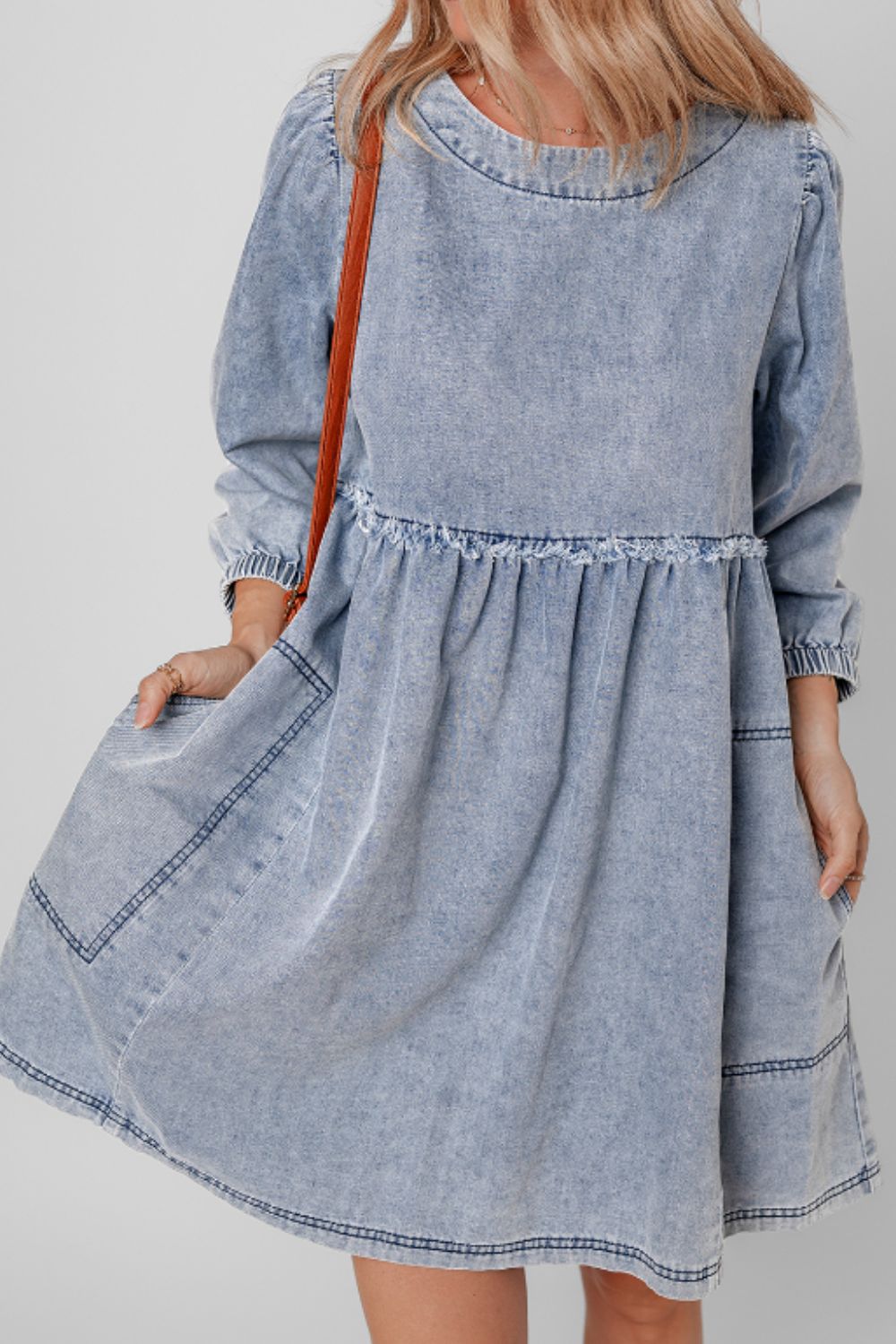 Adorable balloon sleeve denim dress with slightly stretchy fabric and basic style.