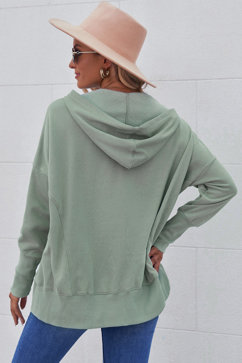 Quarter-Snap Dropped Shoulder Hoodie in sage green, featuring pockets and button details.