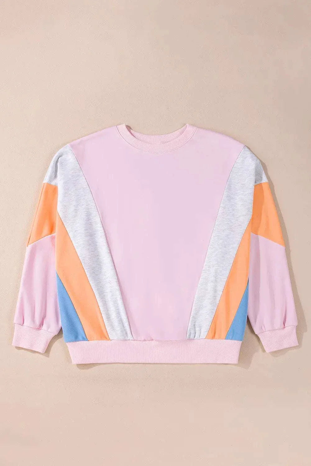 Color block round neck long sleeve sweatshirt with pastel geometric design.