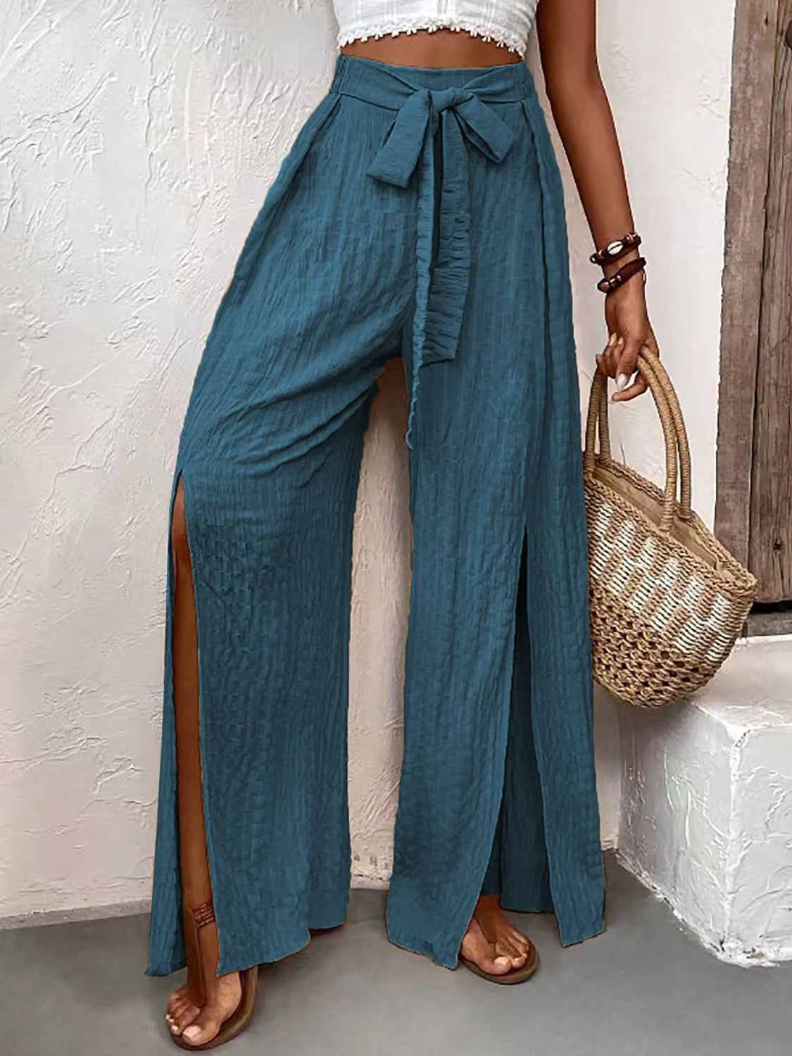 Honey Tied Slit Wide Leg Pants in teal, featuring a flowy design with side slits, made from polyester and elastane.