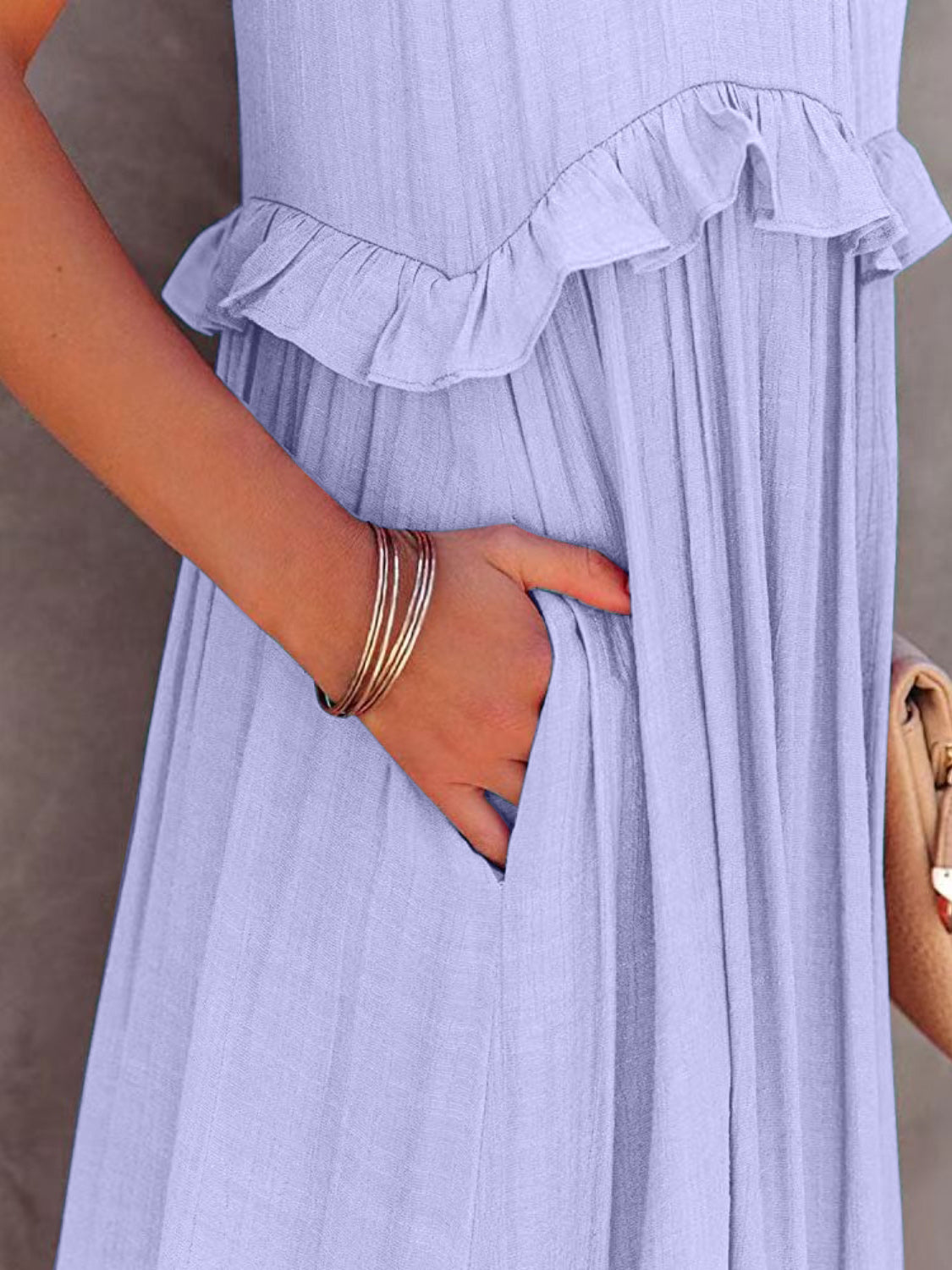 Ruffled sleeveless tiered maxi dress with pockets, 100% polyester, shown in light purple.