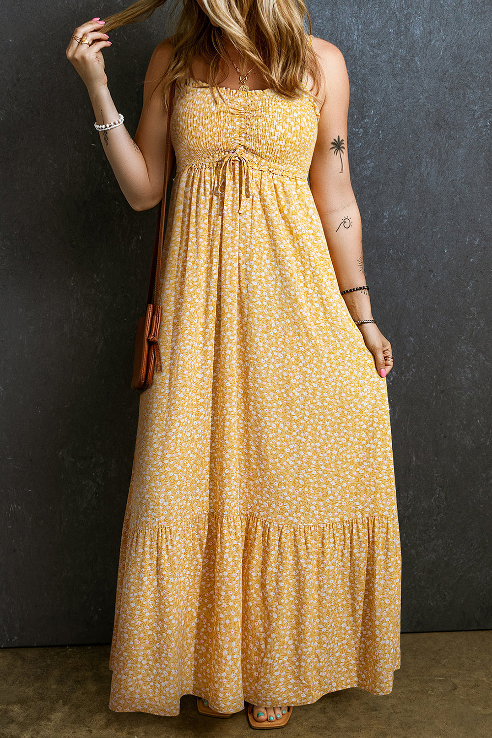 Boho chic floral maxi dress with smocked bodice and ruffled trim.